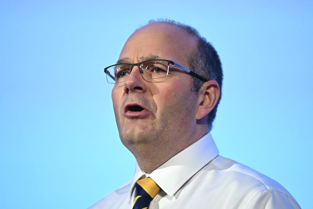 Tom Bradshaw, president of the National Farmers’ Union, speaks on stage during the National Farmers’ Union Annual Conference at the QEII Centre on 25 February 2025 in London.